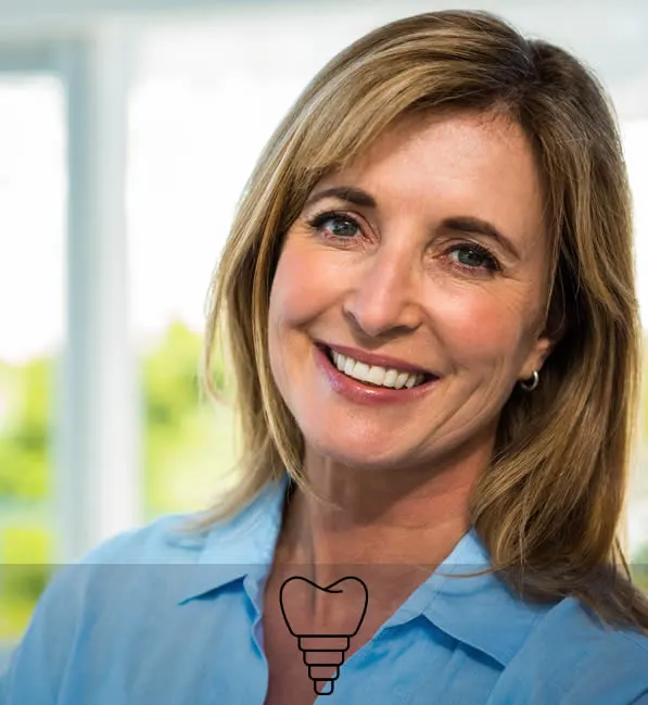 woman smiling after dental implant procedure